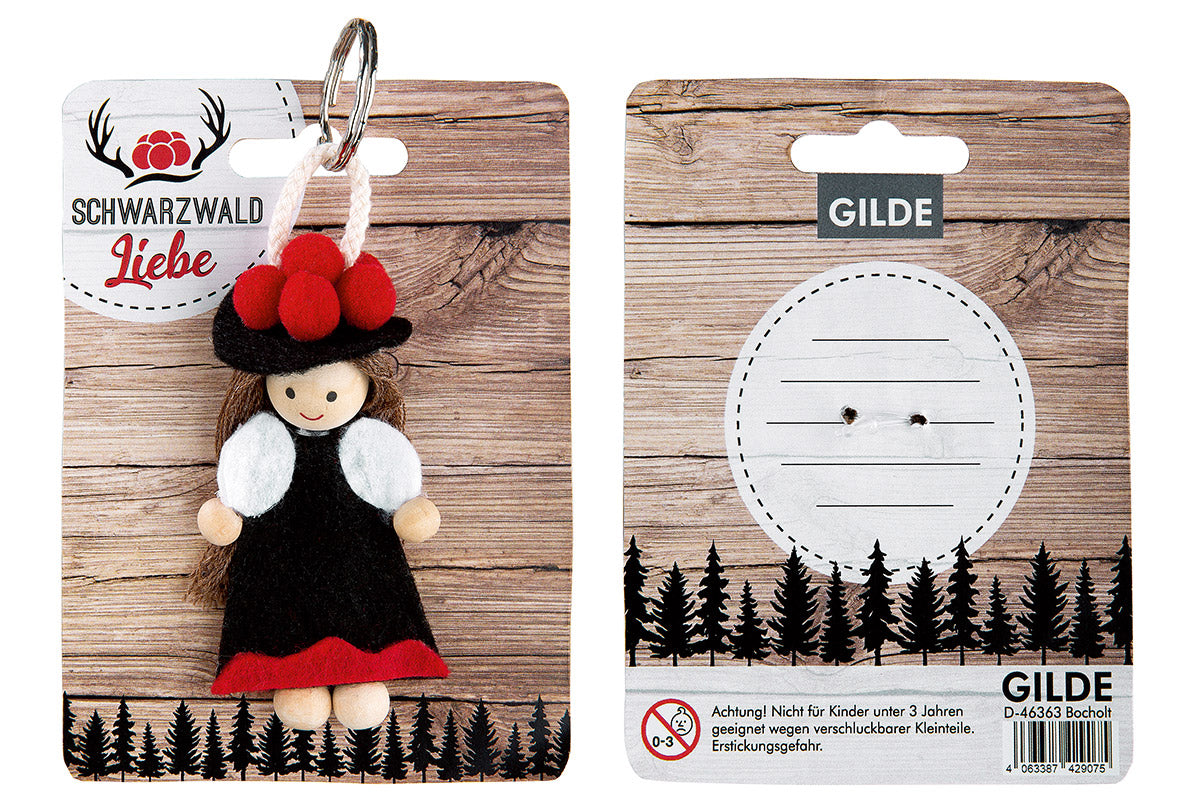 Porte-clés Schwarzwaldmarie avec chapeau à pompons